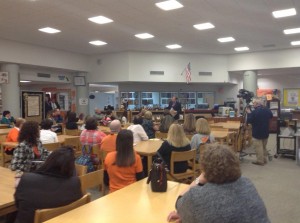 Faculty members packed the library to hear the decision of the Middle States Team